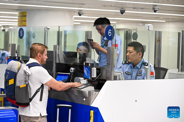 China enhances opening-up to foreign travelers