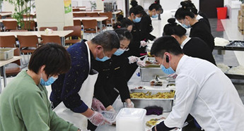 Canteen staff members make a special contribution during epidemic