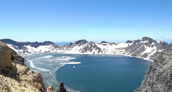 High frozen lakes melt under spring sun